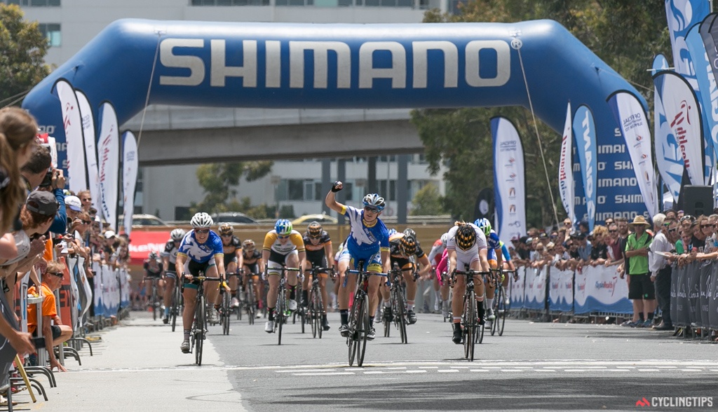 Kimberley Wells sprints to victory in the Shimano Supercrit, ahead of Eileen Roe (Wiggle-Honda) and Chloe Hosking. It is Wells' third criterium victory of the summer, after winning in Noosa and Launceston as well.