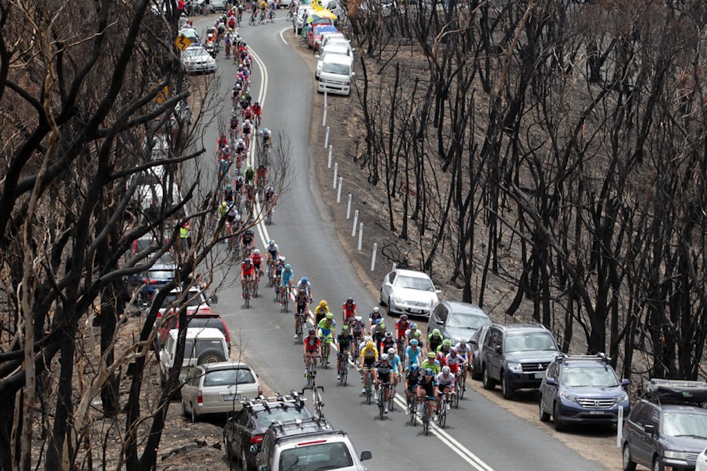 The peloton tackles the day's only classified climb: Checker Hill. Recent bushfires in the area made for an eerie sight as the race passed through.