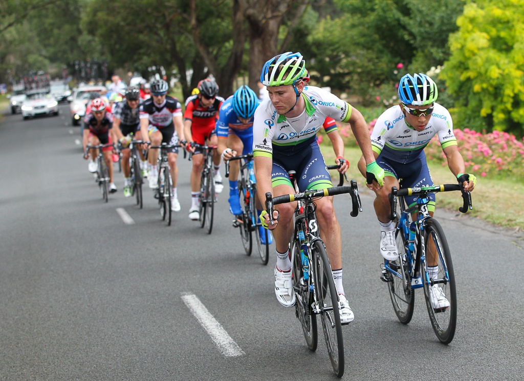 Michael Hepburn offers his teammate Caleb Ewan a helping hand in the lead group in the closing laps.