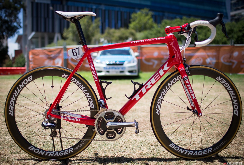 Trek Factory Racing is mostly using the Madone in a striking red. Complimented with Shimano Dura-Ace and Bontrager parts along with SRM powermeters, these make a fine race bike. This bike featured is Calvin Watson's. Read our Trek Madone review here.