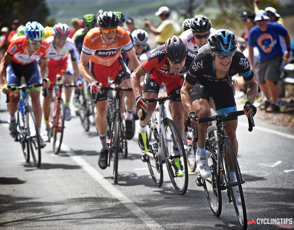 Richie Porte attacks with 1.2km to go and Cadel Evans scrambles to get on his wheel.