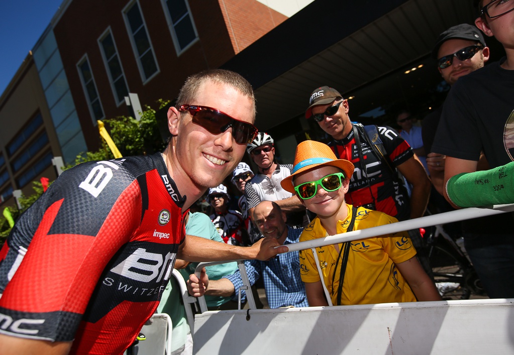 Rohan Dennis poses with some fans of his own before the stage start. He'd have even more to smile about roughly four hours later.