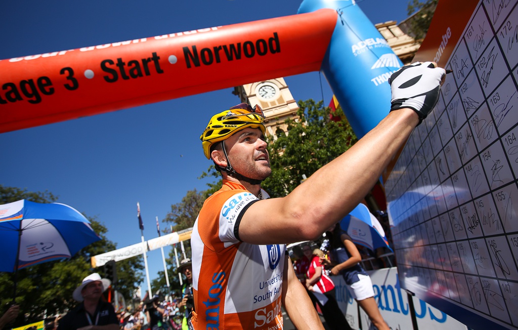 Jack Bobridge signs on at the start of his second day in the ochre leader's jersey.