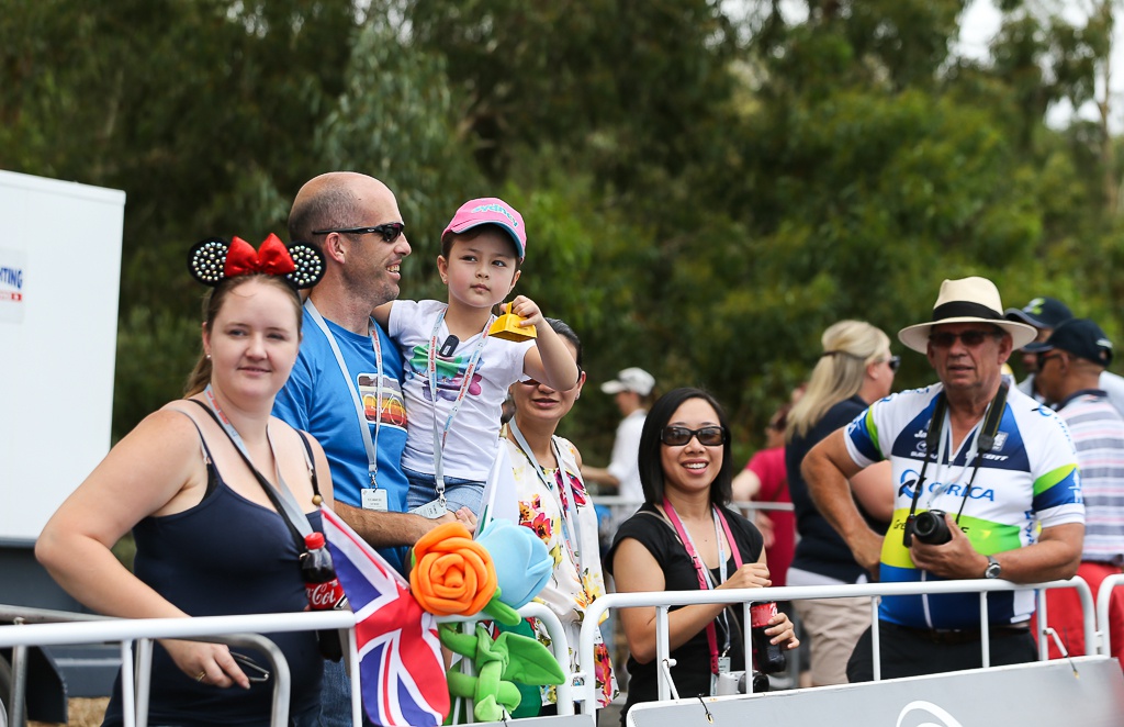 Fans wait for the riders to arrive at the finish in Campbelltown.