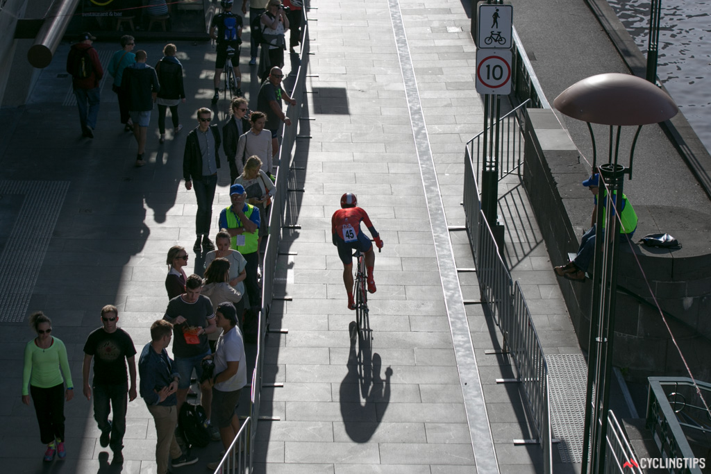 Adam Phelan races along Southbank, as seen from the Princes Bridge.