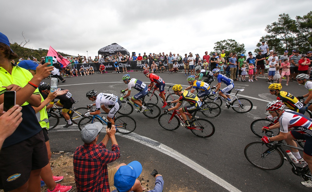 Fans line the course on the way up Arthurs Seat.