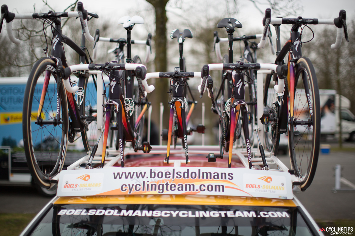 The Boels-Dolmans team car awaits the race start from the team caravan.