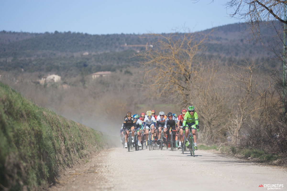 The peloton hits the first of five gravel sections. “It’s unpredictable riding on gravel,” said Iris Slappendel. “Normally you enter a corner and you can make a calculation in your head. You know how fast to take a corner from your own experience. Since I have no experience on gravel, it was hard to make those predictions. It made me really nervous going in and hoping that I made the right calculation beforehand.”