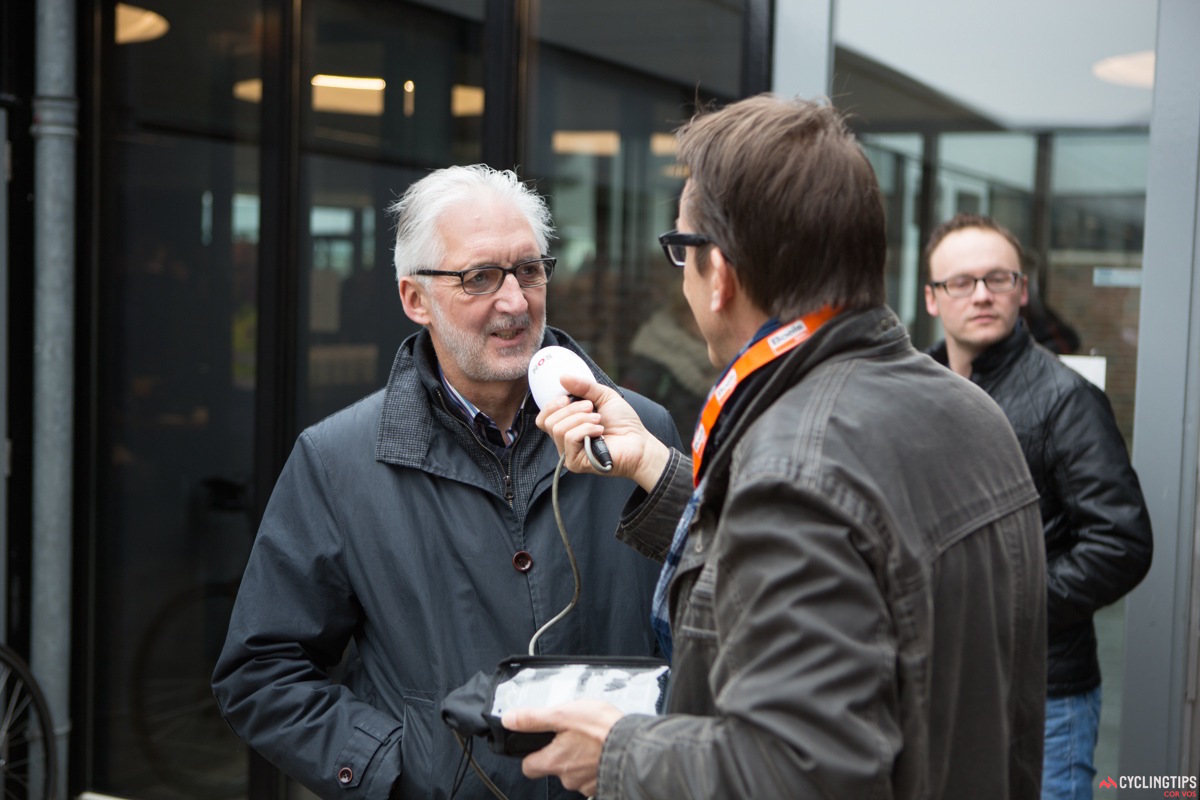 Brian Cookson gives an interview before the start of the race.