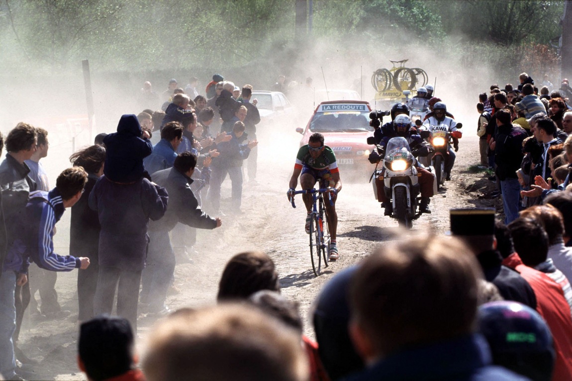 Andrea Tafi battles the cobbles and the dust en route to victory in 1999.