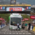 We were all standing around the finish line when we heard a massive scratch/boom! The Orica-GreenEDGE bus hit the finish line gantry while arriving late to the end of the course. The gantry is lowered after the advertising caravan comes through and I was surprised to see the OGE bus there at this late stage of the race. In a press release, Matt White explained: "The bus was led under the finish gantry, and it we took for granted that there was enough clearance. We’ve had this bus since we started the team, and it’s the same bus we took to the Tour last year. 
Our bus driver was told to move forward and became lodged under the finish gantry. He followed all instructions in the process that followed thanks to the hard work by ASO that allowed him to remove the bus before the finish. It was the best possible outcome given the situation." 
According to reports, GreenEDGE was fined 2000CHF for the incident with the late bus. Jokes aside, it wasn't GreenEDGE's fault for the mishap. It was chaos getting accredited vehicles to finish area and lots of miscommunication from the road marshalls.