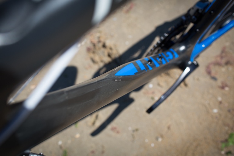 The aero-profile downtube broadens and reshapes this way because the bike was developed with the idea that a round drinks bottle would be fitted.