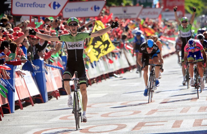 Bauke Mollema wins stage 17 of the 2013 Vuelta a Espana with David Tanner celebrating behind.