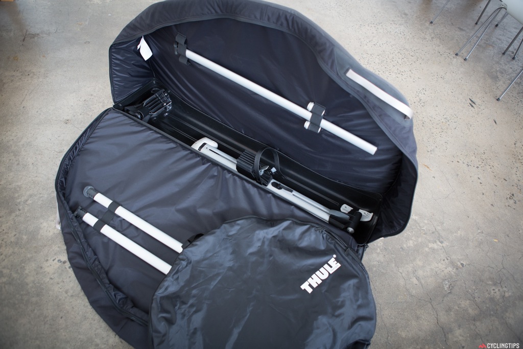 The Thule RoundTrip Pro has a rugged nylon shell with an aluminium rail to protect bike during transport, which also turns into a removable assembly stand. Tow nylon wheel bags are also included.  