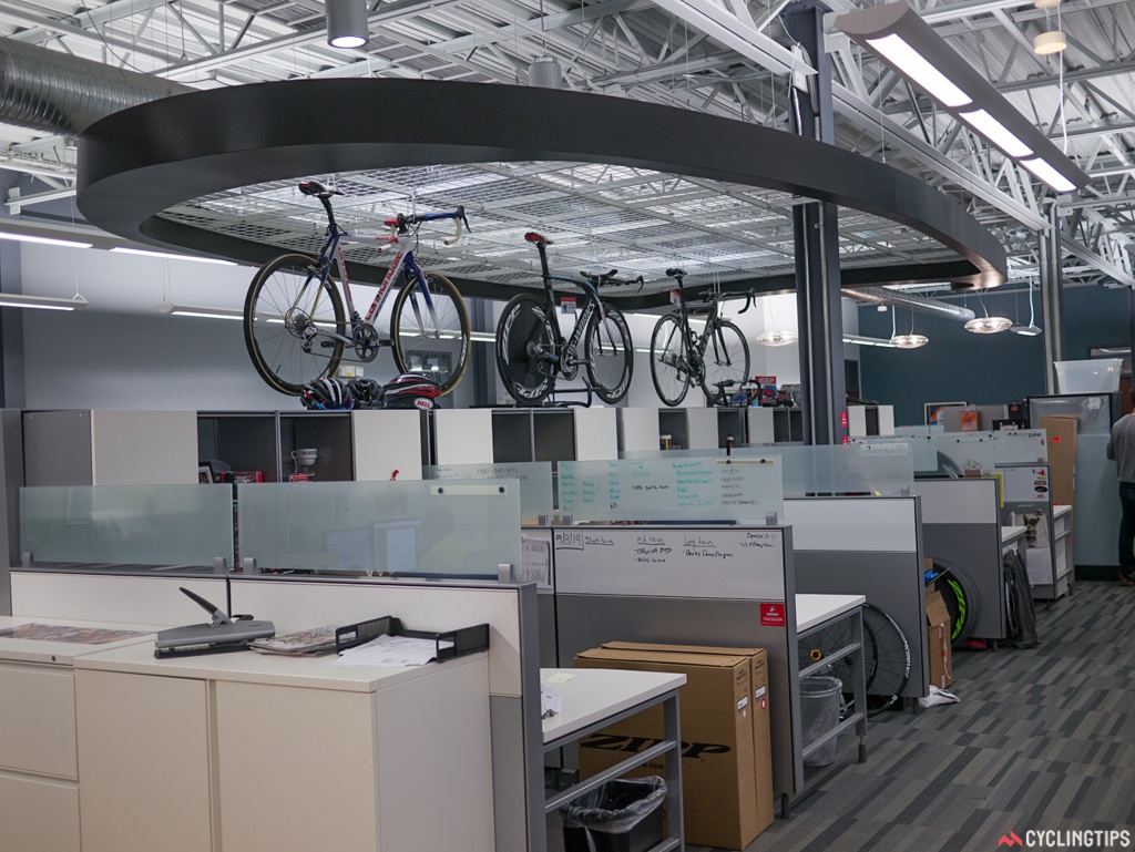 Above the offices hangs a huge outline of a cross section of a Zipp rim